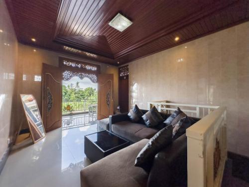 Χώρος καθιστικού στο Tiara Guest House Ubud
