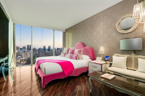 Katil atau katil-katil dalam bilik di Hotel Éclat Beijing