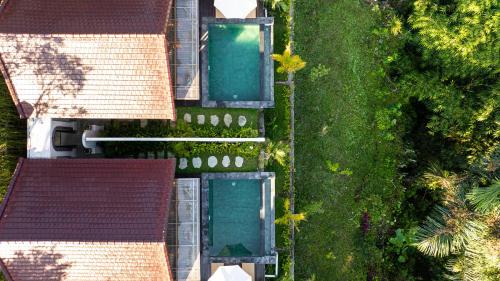 Πισίνα στο ή κοντά στο Nila Villa Ubud