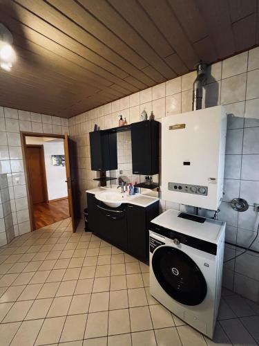 Η κουζίνα ή μικρή κουζίνα στο Pension mitten im Pfälzerwald
