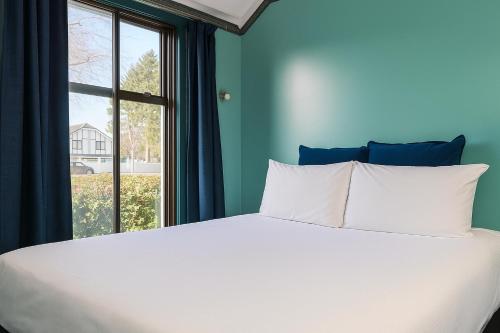 Katil atau katil-katil dalam bilik di Pure Motel