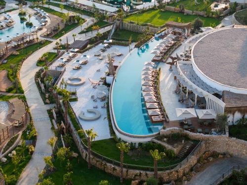 an aerial view of a pool at a resort at Ethno Belek in Belek