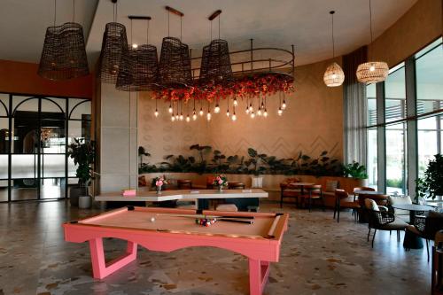a room with a ping pong table in a restaurant at Ethno Belek in Belek