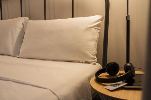 Кровать или кровати в номере room00 Ventura Hostel