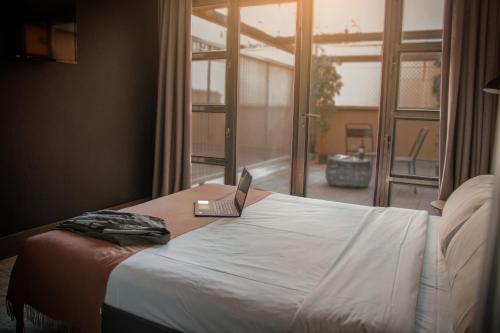 Кровать или кровати в номере room00 Ventura Hostel