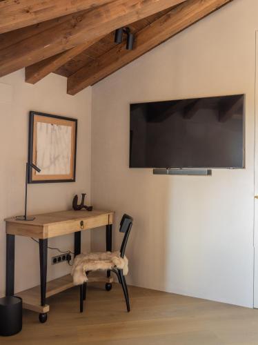 Μια τηλεόραση ή/και κέντρο ψυχαγωγίας στο Hotel Boutique Mirador de Deyo