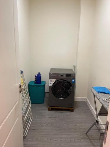 a washer and dryer in a room at Chic City Oasis at Gazebo in Addis Ababa