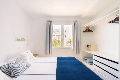 Posteľ alebo postele v izbe v ubytovaní Neptuno Suites - Adults Only