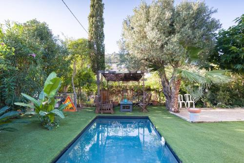Photo de la galerie de l'établissement Ravissante maison, piscine, pétanque, proche plage, à Hyères
