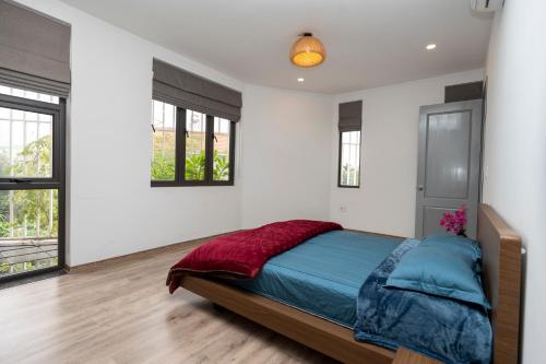 Cama o camas de una habitación en Cozy Embassy Garden