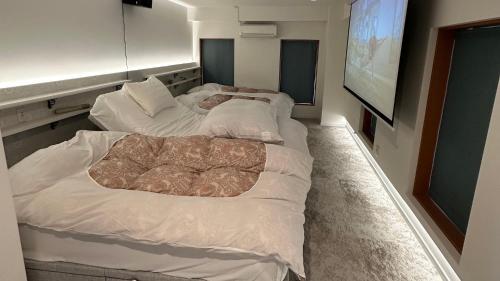 天空のホテル夢寿庵にあるベッド