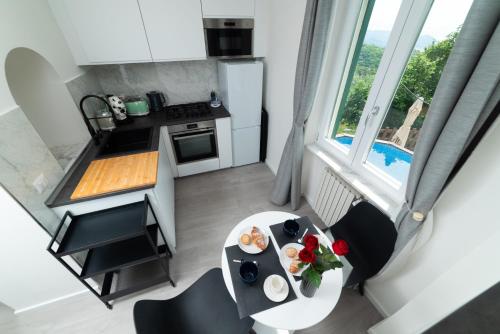 Kuchyň nebo kuchyňský kout v ubytování Seaview, Two Pools, Sauna & Relax - Suite Dorotea