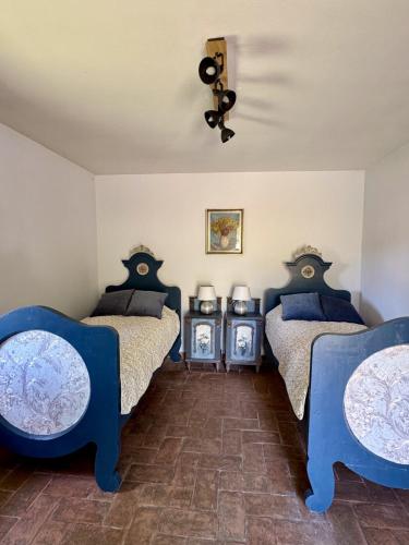 Ένα ή περισσότερα κρεβάτια σε δωμάτιο στο Villa Nilla - Enchanting Villa on the Hills