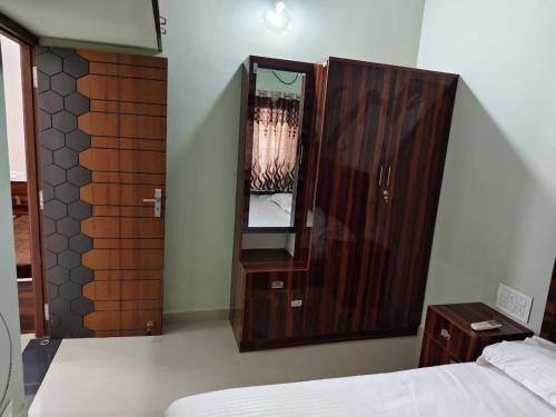 Alif serviced Apartment for Families and Executives客房内的一张或多张床位