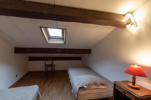 Postel nebo postele na pokoji v ubytování Les Sources Gîte La Grange