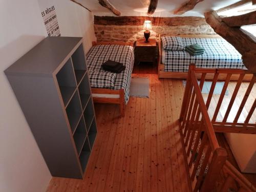 Una cama o camas en una habitación de La Brenatière