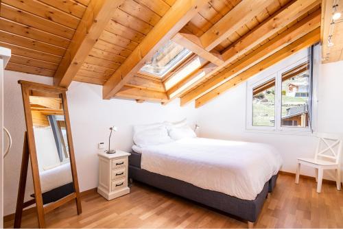 Postel nebo postele na pokoji v ubytování Chateau Penthouse