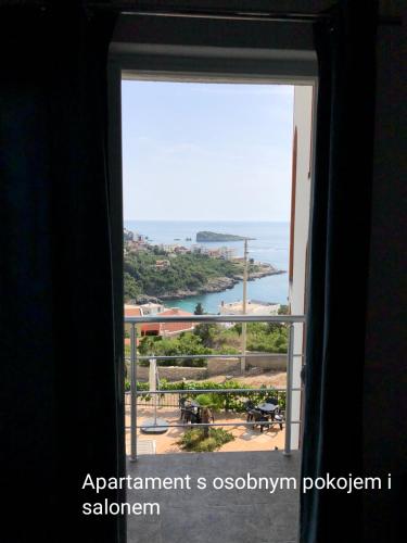a window with a view of the ocean at Open Sky Montenegro in Utjeha