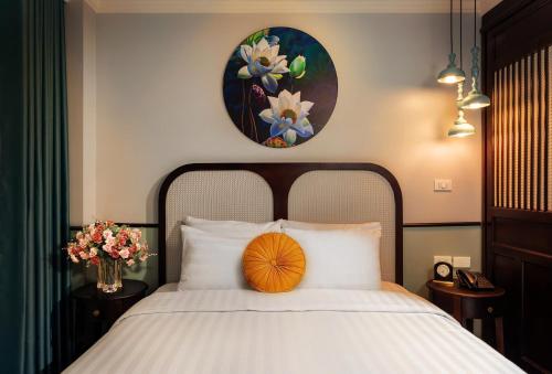 Lotusama Central Hanoi Hotelにあるベッド