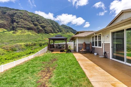 a patio with a gazebo on a house at @ Marbella Lane - Mesmerizing Ocean + MT Views in Waianae