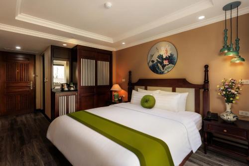 Lotusama Central Hanoi Hotelにあるベッド