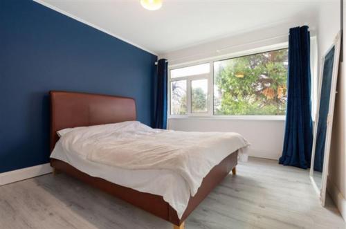 Ένα ή περισσότερα κρεβάτια σε δωμάτιο στο City Apartment