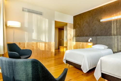 Postel nebo postele na pokoji v ubytování Hotel Tartu