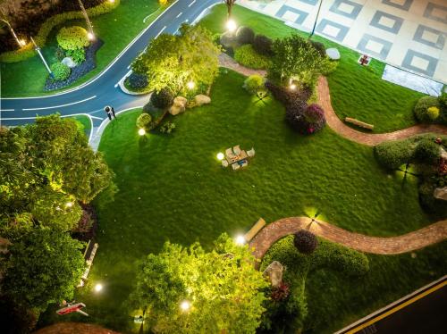 an overhead view of a park with trees and lights at Yongchun Laimeng Garden Hotel in Yung-ch'un-hsien