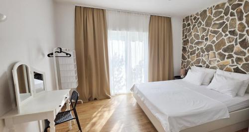 Letto o letti in una camera di Island Cottage Apartment