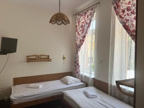 Una cama o camas en una habitación de Willa Safona