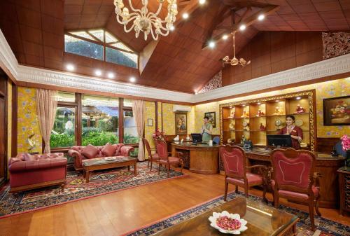a large room with a bar in the middle at Mayfair Spa Resort & Casino in Gangtok