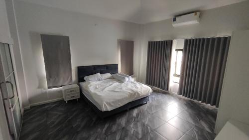 Katil atau katil-katil dalam bilik di Avipoolvilla