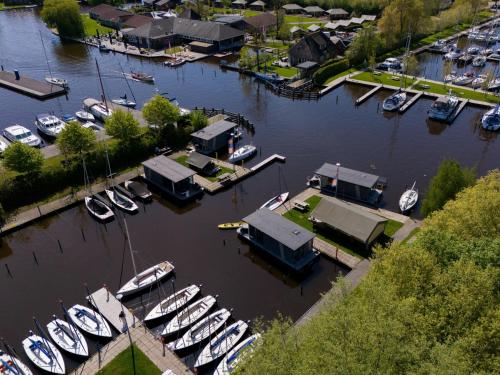 an aerial view of a marina with boats in the water at Safaritent Heeg 4 persoons in Heeg