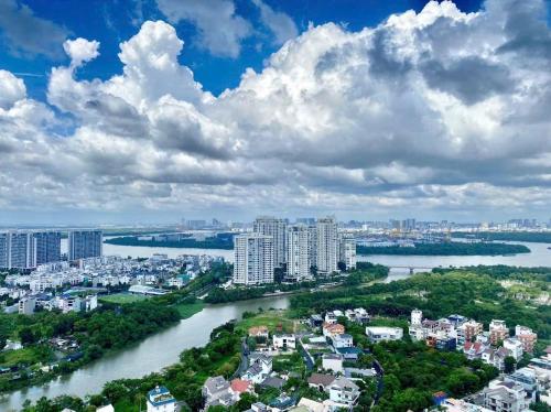 an aerial view of a city with a river and buildings at The Sun Avenue Serviced Apartment in Ho Chi Minh City