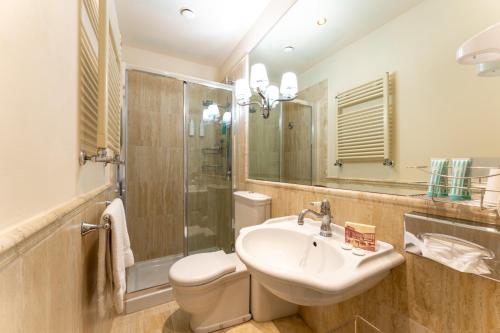 Koupelna v ubytování Hotel Pendini