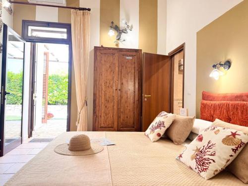 Posteľ alebo postele v izbe v ubytovaní Villa B&B Antiche Macine del Salento - nel cuore del Salento