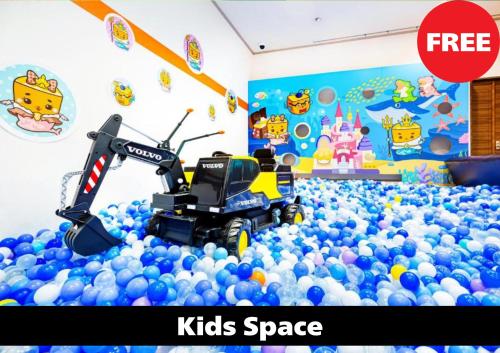 a lego robot in a pile of balls at Anda no Mori Osaka Tennoji Tower Near Namba - Family Kids Concept in Osaka