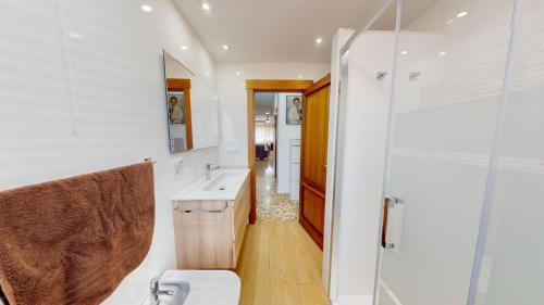 a bathroom with a toilet and a sink and a shower at Exclusive Villa in Catadau: Pool & Private Gardens in Catadau