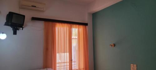 Телевизор и/или развлекательный центр в Hotel Matina