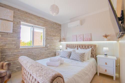 Ένα ή περισσότερα κρεβάτια σε δωμάτιο στο Apartment Bela Vista