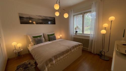 Ένα ή περισσότερα κρεβάτια σε δωμάτιο στο Villa MICHEL PremiumFerienhaus inkl Bettwäsche Handtücher