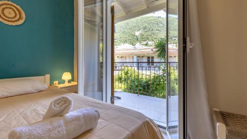 En balkon eller terrasse på Konstantinos Pool & Fun Apartments