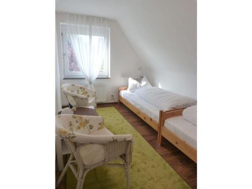 Postel nebo postele na pokoji v ubytování Haus Böhler Sand
