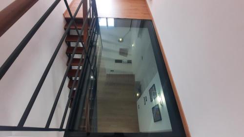 a view of a staircase from the second floor of a building at Oltre i Canti in Palermo
