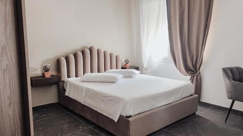 Postel nebo postele na pokoji v ubytování Comodo e Moderno Vicino Mare e Città