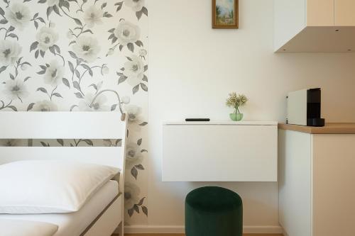Cama o camas de una habitación en DAINN Apartments Schönbrunn