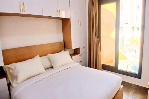 One bedroom apartment with a hall in Aqua Infinity Resort before El Gouna