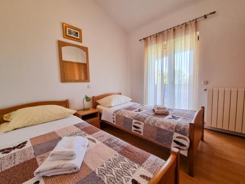 Postel nebo postele na pokoji v ubytování Juli No3 & No4