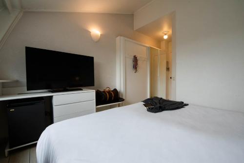 Axolute Comfort Hotel Como Cantùにあるベッド