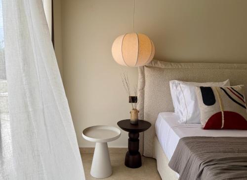 Ένα ή περισσότερα κρεβάτια σε δωμάτιο στο Kisterna Luxury Living
